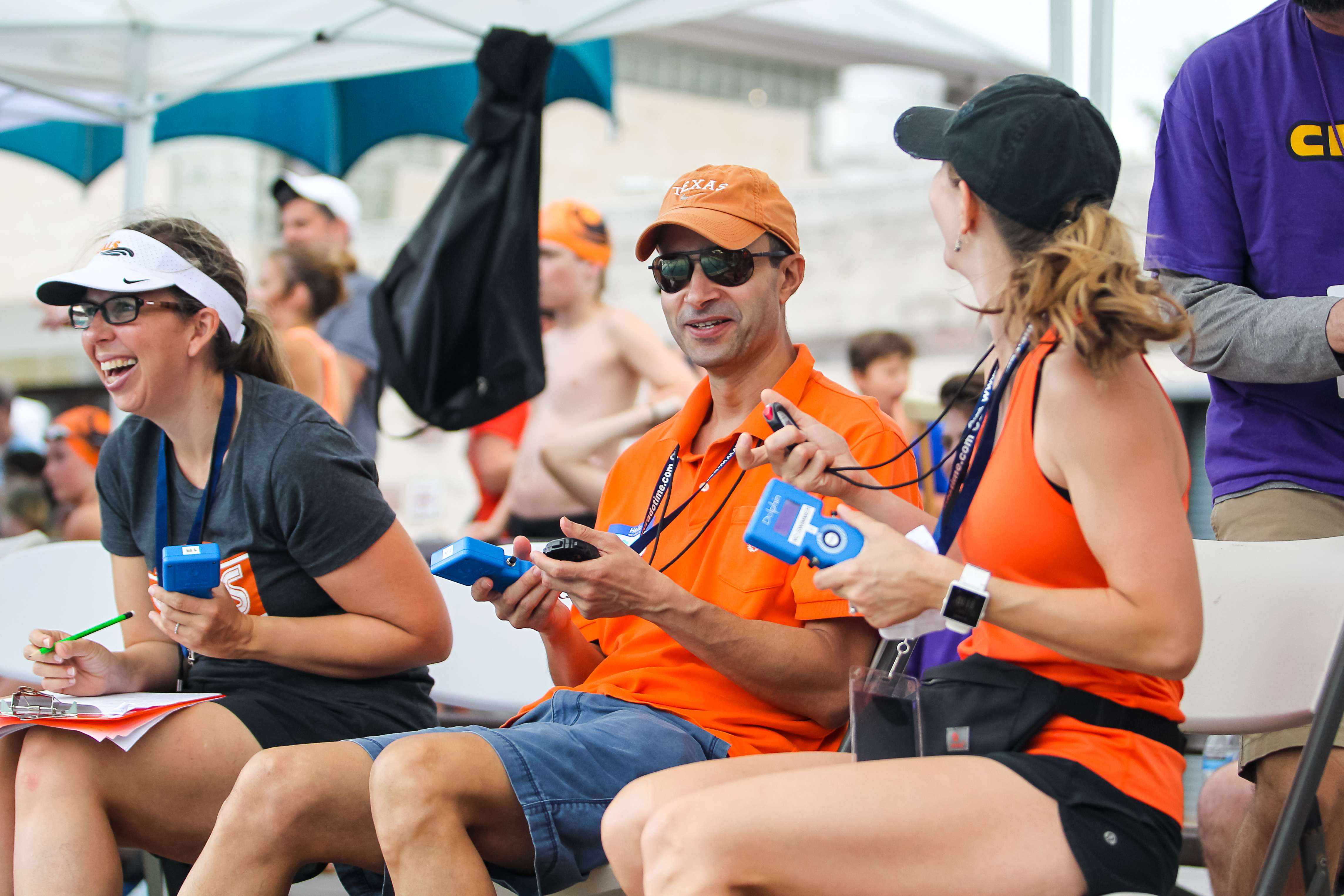 Volunteers using Dolphin Wireless Timing Stopwatches